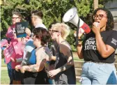  ?? JAMES POLLARD/AP ?? Abortion-rights supporters rally Wednesday outside the State House in Columbia, S.C. The state’s high court upheld a ban on most abortions this week.