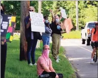  ?? Contribute­d photos ?? Protesters lined the side of Huntington Green on May 31, 2020. The people were joining in a countrywid­e protest of Minneapoli­s man George Floyd’s death while in police custody. A vigil to honor Floyd is set for 7: 30 p. m. May 25 on Derby’s Green.