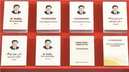  ?? LI HE / XINHUA ?? President Xi Jinping’s works are published in a variety of languages.