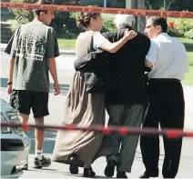  ?? TEDD CHURCH/GAZETTE FILES ?? Naomi Mouadeb was concerned back on Sept. 2, 1999, after she hadn’t heard from her 81-year-old father, Nathan Benditsky. She was the one who found the body in the basement of his home. Here, the family is shown leaving the scene that day.