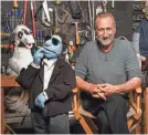  ?? ROBERT HANASHIRO/USA TODAY ?? Brian Henson, director of “The Happytime Murders,” sits with Phil Phillips.