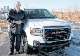  ?? BRENDAN MILLER • POSTMEDIA NEWS ?? Trevor Lynn stands six-foot-three inches tall, but had no problem getting in and out of the 2021 GMC Canyon.