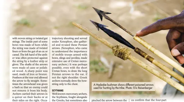  ??  ?? A Hadzabe bushman shows different poisoned arrows used for hunting by the tribe. Photo: Eric Reisenberg­er