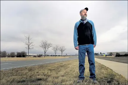  ?? PHOTOS BY MATTHEW JONAS / Boulder Daily Camera ?? Justin Robbins poses for a portrait near Airport Road in Longmont on March 12. Robbins walked every street in Longmont from Nov. 1 through March1.