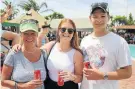  ?? Picture: BRIAN WITBOOI ?? FOR THE GIRLS: Yolanda Cooper, left, Hannah Erasmus and Blake Cooper enjoy a cold drink at the Water Polo Festival For Girls held at Alexander Road High School pool on Saturday