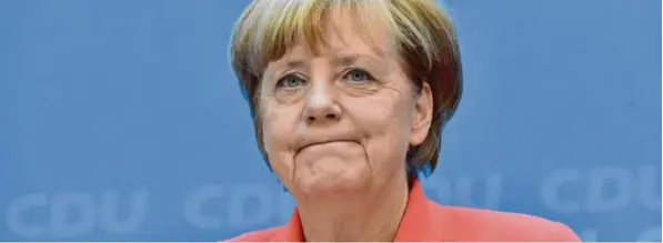  ?? Foto: John MacDougall, afp ?? CDU-Chefin Angela Merkel: „Beinahe zu einer Leerformel geworden.“