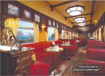  ??  ?? The bar/ bar/lounge lounge car aboard theh he e