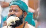 ?? SAUMYA KHANDELWAL/HT PHOTO ?? Farmers from Tamil Nadu stage a protest at Jantar Mantar on Monday by holding mice in their mouths.