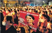  ?? ?? In this file photo, a candleligh­t vigil in Yangon to honour those who have died during demonstrat­ions against the coup.