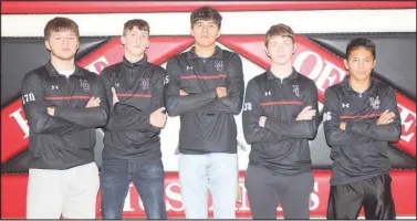  ?? RICK PECK/ SPECIAL TO MCDONALD COUNTY PRESS ?? Senior members of the 2020-21 McDonald County High School wrestling team. From left to right: Caleb Gardner, Ryan Donica, Karlo Barreda, Jordan Meador and Victor Lopez.