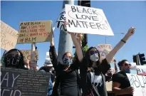  ?? BEA AHBECK/NEWS-SENTINEL ?? People protest during a peaceful Black Lives Matter protest in Lodi on Sunday, June 7, 2020.