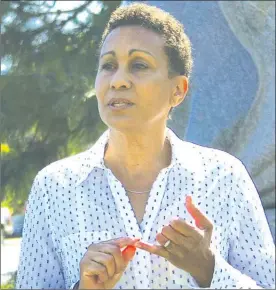  ?? SUSAN McIVER/Special to The Herald ?? Toni Boot announced her candidacy for Summerland mayor Tuesday morning. She made the announceme­nt in front of a few dozen supporters gathered at The Bear stone statue near the Summerland Museum.