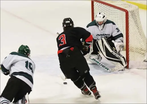  ?? Photo by Michelle Menard ?? PSW defenseman Cam Yee (3) scored a second period goal and also delivered an assist to lead No. 3 PSW to a 6-2 victory over No. 2 Ponaganset Friday night.