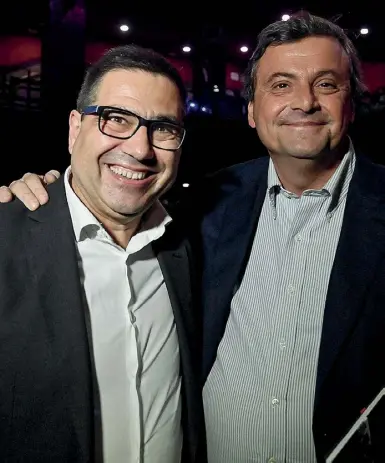  ?? (foto Antimiani/Ansa) ?? L’assessore uscente Alessio D’Amato, a sinistra, con il leader di Azione Carlo Calenda