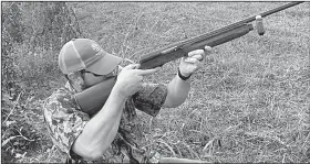  ?? Arkansas Democrat-Gazette/BRYAN HENDRICKS ?? A hull flies from Dusty McDaniel’s 16-gauge Remington Model 11 on Sunday as he fires at a dove in Pulaski County.