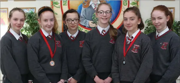  ??  ?? Loreto students Ella Lawless, Rebecca McCabe, Hannah Kelly, Aoife Carter, Eve Barry and Eve McCool, medal winners at the Wicklow Invitation­al Cross Country championsh­ips.