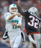  ?? File photo ?? Quarterbac­k Ryan Tannehill (17) and the Dolphins will put their undefeated record on the line in Foxboro next Sunday.