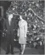  ??  ?? In this Dec. 13, 1961file photo, President John F. Kennedy and his wife, Jacqueline, pose in front of the Christmas tree in the Blue Room of the White House in Washington.