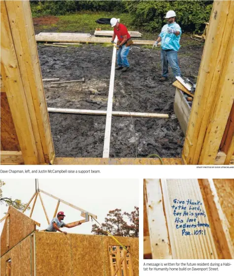  ?? STAFF PHOTOS BY DOUG STRICKLAND ?? Dave Chapman, left, and Justin McCampbell raise a support beam.