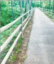  ??  ?? The Tuttle loop section of the Westlake and Mattabesse­t Bike and Walking Trail in Middletown.