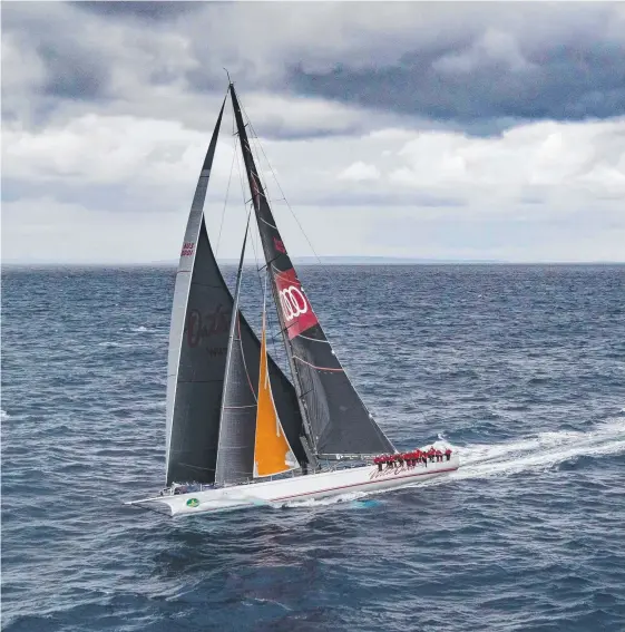  ?? Picture: AFP PHOTO/ROLEX/STEFANO GATTINI ?? Supermaxi Wild Oats XI has also suffered a torn sail and spinnaker but has managed to continue in the Sydney to Hobart.