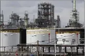  ?? PAUL SANCYA — THE ASSOCIATED PRESS FILE ?? Storage tanks are shown at a refinery in Detroit, Tuesday. The White House on Tuesday said it had ordered 50 million barrels of oil released from strategic reserve to bring down energy costs.