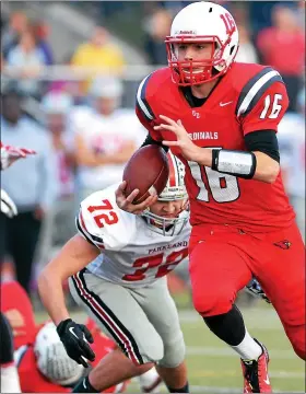  ?? MEDIANEWS GROUP FILE PHOTO ?? Upper Dublin quarterbac­k Ryan Stover (16) scrambles past Parkland defenders for a touchdown during second-half action of their PIAA 4A football semifinal contest at Souderton Area High School on Saturday December 12, 2015