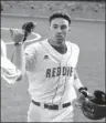  ?? Submitted photo ?? TWO MORE: Henderson senior second baseman Nolan Ryan celebrates with his teammates Sunday after a two-run home run against Southweste­rn Oklahoma State in the 2018 GAC Baseball Championsh­ip tournament in Enid, Okla. The Reddies advanced with a 9-5...