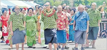  ?? Picture: JONA KONATACI ?? Men and women of Cikobia on their way to give their soli during the Vanuabalav­u Day celebratio­ns at the ANZ Stadium car park on Saturday.