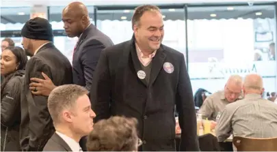  ?? MAX HERMAN/FOR THE SUN-TIMES ?? Cook County assessor candidate Fritz Kaegi greets fellow Democrats on Tuesday at Manny’s Deli.