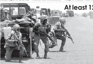  ?? AGENCE FRANCE PRESSE ?? Malian army soldiers man their position after a hotel siege in Mali.