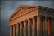  ?? MANUEL BALCE CENETA — THE ASSOCIATED PRESS FILE ?? The U.S. Supreme Court is seen at sunset in Washington. The Supreme Court is siding with Google in an $8 billion copyright dispute with Oracle.
