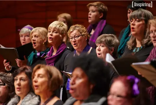  ??  ?? ABOVE: The No Excuses! choir in full voice at the Melbourne Recital Centre. Performing in the choir is an empowering experience for these women, whose lives have been touched by domestic violence.