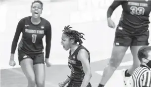  ?? STEPHEN SPILLMAN/AP ?? Angel Baker celebrates during Wright State’s first-round upset of Arkansas on Monday. Baker’s 3-pointer with 29.1 seconds left gave the Raiders the lead for good. She finished with 26 points.