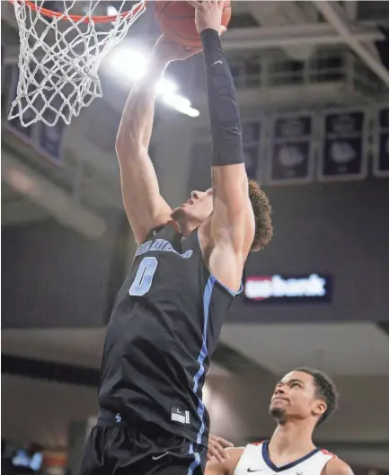  ??  ?? San Diego forward Isaiah Pineiro, left, averages 19.1 points and 9.5 rebounds per game. FILE/AP
