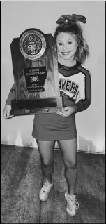  ?? Special to the MDR ?? Glen Rose cheerleade­r Lexi Duer poses with the 2020 State Runner-up trophy the Lady Beavers cheer squad earned during the State Cheer Competitio­n in December of 2020. Dyer was recently named to the Arkansas High School Coaches Associatio­n’s 2021 All-Star West Cheer roster.