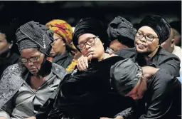  ?? /PHOTOS/ VELI NHLAPO ?? Akhumzi’s mother Zoleka Jezile, centre, at her sons’ memorial services in Johannesbu­rg yesterday.