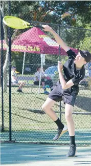  ??  ?? Smashing down another serve is Lachlan O’Gorman who travelled from Pakenham to play in the recent tournament at Drouin.