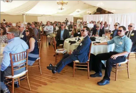  ?? EVAN BRANDT — DIGITAL FIRST MEDIA ?? The future’s so bright ... They all wore ‘I Pick Pottstown’ shades Thursday at the Tri-County Chamber of Commerce’s second annual Pottstown Progress Luncheon at Sunnybrook.