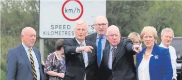  ??  ?? Michel Barnier is shown the cross-border road on the N53 road between Co Louth and the A37 road in Co Armagh