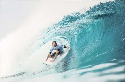  ?? PICTURE: WSL/POULLENOT ?? ON TOP OF THE WORLD: Jordy Smith in action at Teahupo’o in Tahiti.