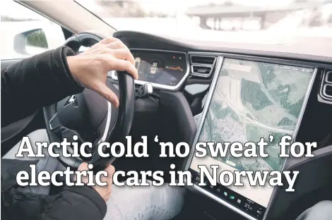  ?? — AFP photos ?? Benassi drives his car in Jessheim, southeast Norway.
