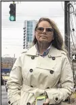  ?? BILL TORPY / AJC ?? Melissa Runyan was so disturbed by an SUV with blue lights during rush hour on Peachtree Road that she called police — on the mayor.