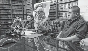  ?? Steve Gonzales / Staff file photo ?? Norma Mottu, second from left, lawyer Benny Agosto Jr., center, and John Garza Jr. address the media about the effects of toxic chemicals emitted into the air by Interconti­nental Terminals Co. following the fire in March.