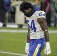  ?? MORRY GASH — THE ASSOCIATED PRESS ?? Los Angeles Rams’ Leonard Floyd walks off the field after his team loss to the Green Bay Packers.