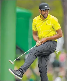  ?? David J. Phillip The Associated Press ?? Tony Finau has finished in the top five of all four major championsh­ips, his best showing a third-place finish at the 2019 British Open.