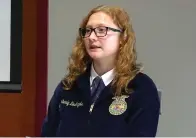  ?? The Sentinel-Record/Lance Porter ?? ■ Kimberly Deangelis, the junior adviser for the Lake Hamilton High School chapter of the National FFA Organizati­on, speaks during the school’s Regional Career and Technical Education Showcase.