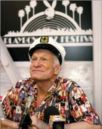  ?? ASSOCIATED PRESS ?? In this June 17, 2006, file photo, Hugh Hefner, executive producer of the Playboy Jazz Festival, takes questions from reporters at the Hollywood Bowl in Los Angeles. The magazine founder and sexual revolution symbol died at age 91 this week.