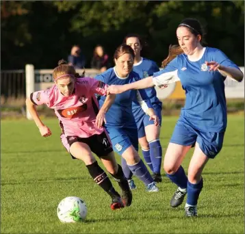  ??  ?? Linda Douglas of Wexford Youths goes past Manolla FC’s Megan Costello at Ferrycarri­g Park.