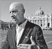  ?? GREGORIO BORGIA/AP ?? Peter Isely, founding member of Ending Clergy Abuse, talks to reporters Sunday at the Vatican.